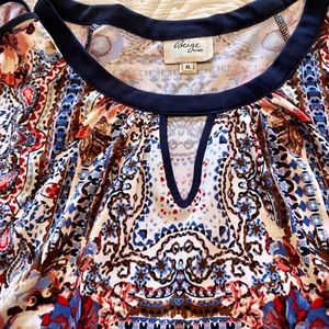 Anthropologie cold shoulder top. Waist flattering